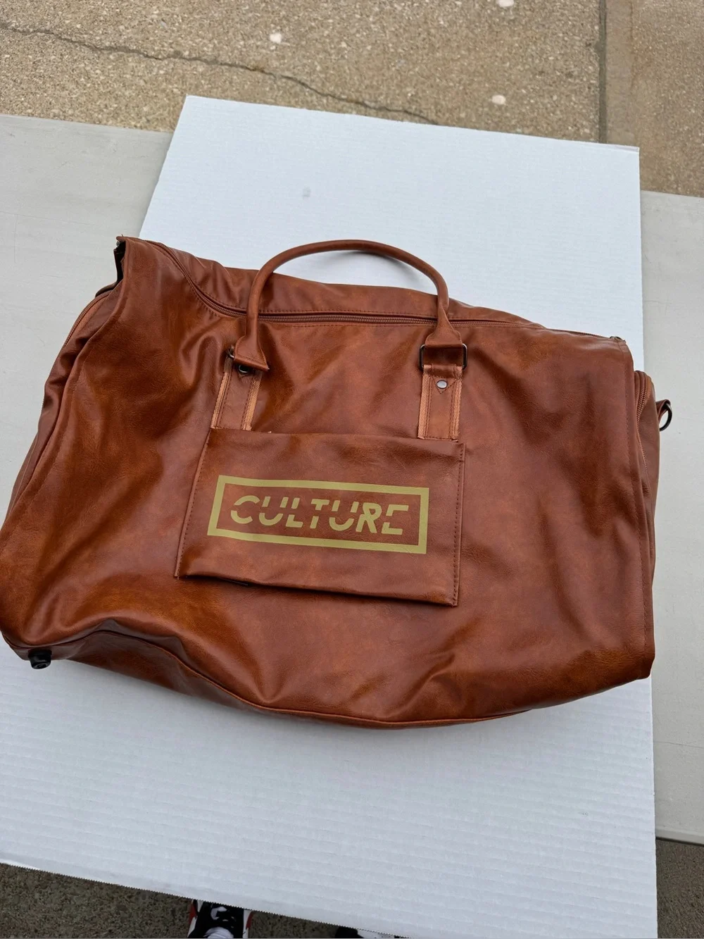 Culture Wardrobe Duffel. Shoulder strap and carry handles. NEW